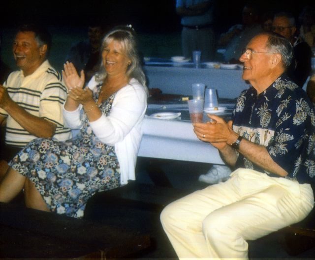 Henry Benjamin, Bill Nelson and his soul-mate, Christine Torrisi (all watching Joan dancing on the table)