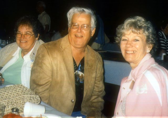 Roger Burrage, wife Donna (left) and Joyce (Boulerice) Silva (pink)